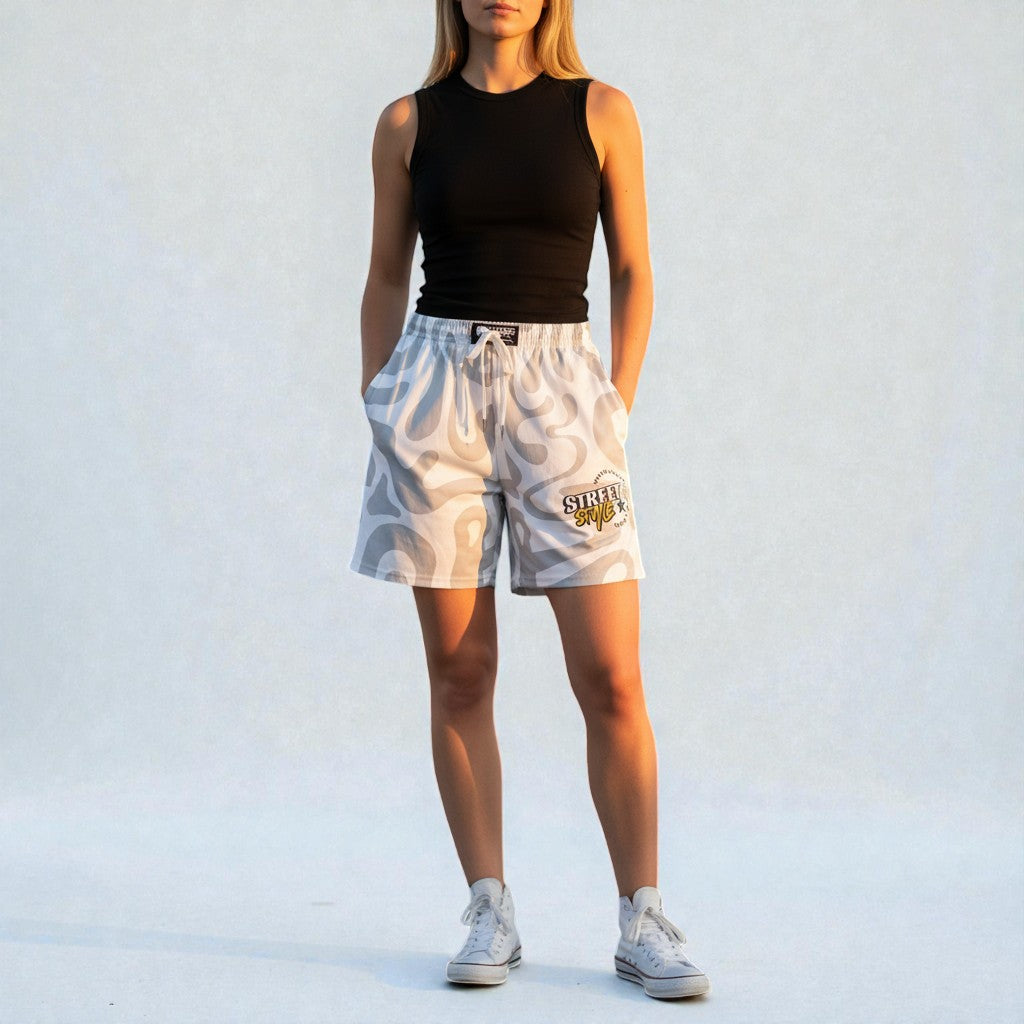MONROE STORE white athletic shorts with grey abstract pattern, elastic waistband, and drawstring. Men's casual wear.