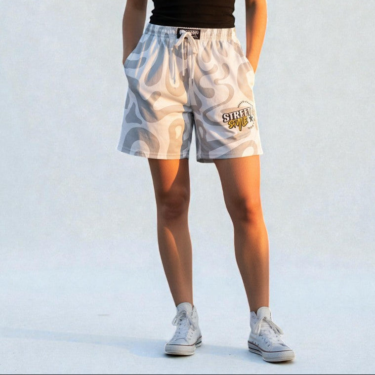 MONROE STORE white athletic shorts with grey abstract pattern, elastic waistband, and drawstring. Men's casual wear.