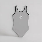 Bañador de una pieza MONROE STORE gris con ribetes negros, diseño retro inspirado en la danza y soporte elástico.