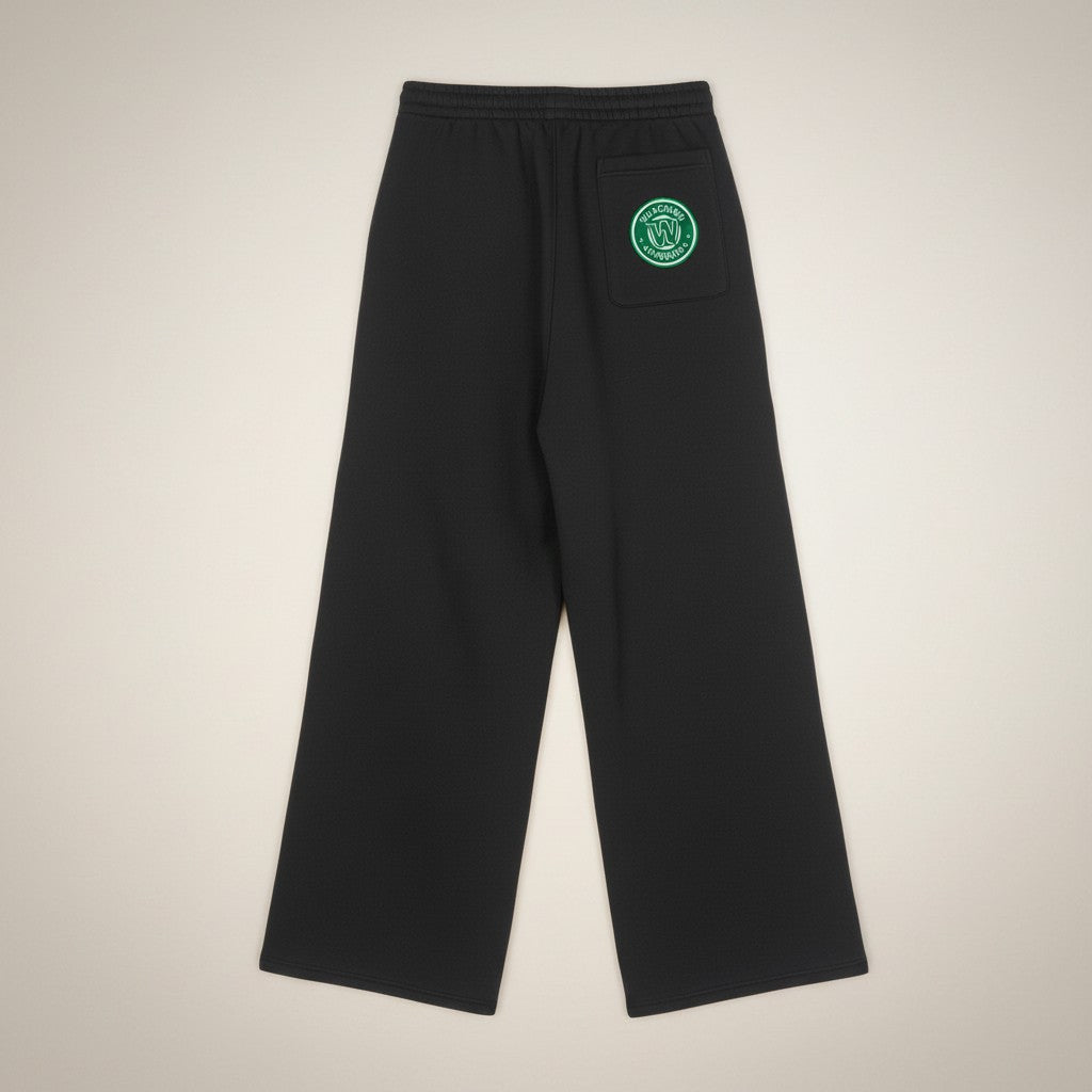 MONROE STORE black fleece drawstring sweatpants with a green embroidered logo patch on the back pocket.
