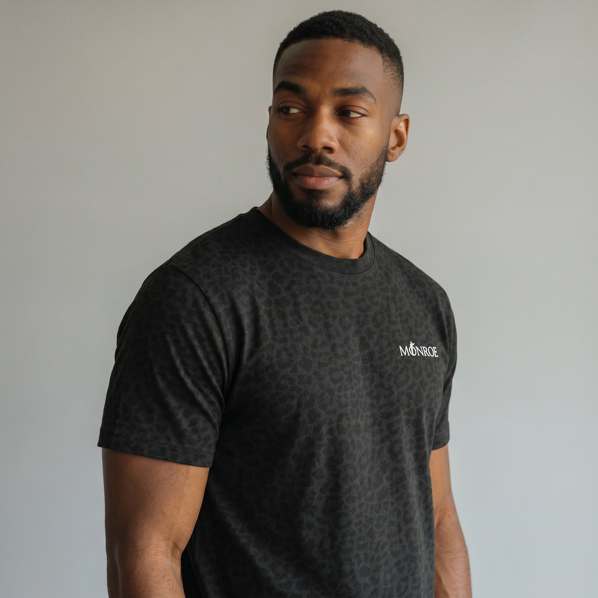 MONROE STORE men's black leopard print graphic tee, crew neck, short sleeves, made of cotton blend.