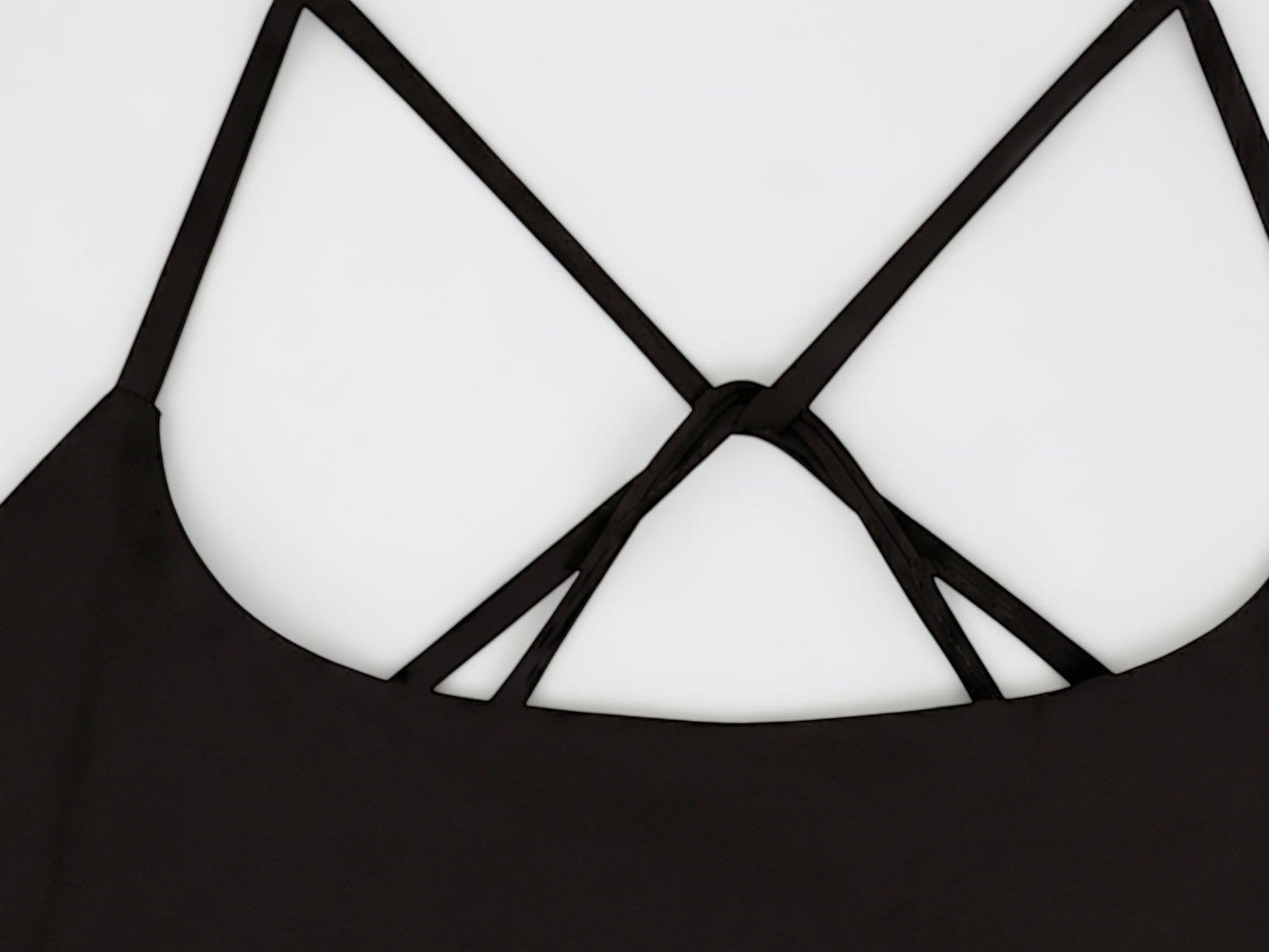 MONROE STORE black strappy criss-cross back sports bra for women. Ideal for yoga and gym.
