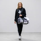 MONROE STORE bolsa de gimnasio negra y blanca con estampado "DANCE", cierre de cremallera doble y correa ajustable.