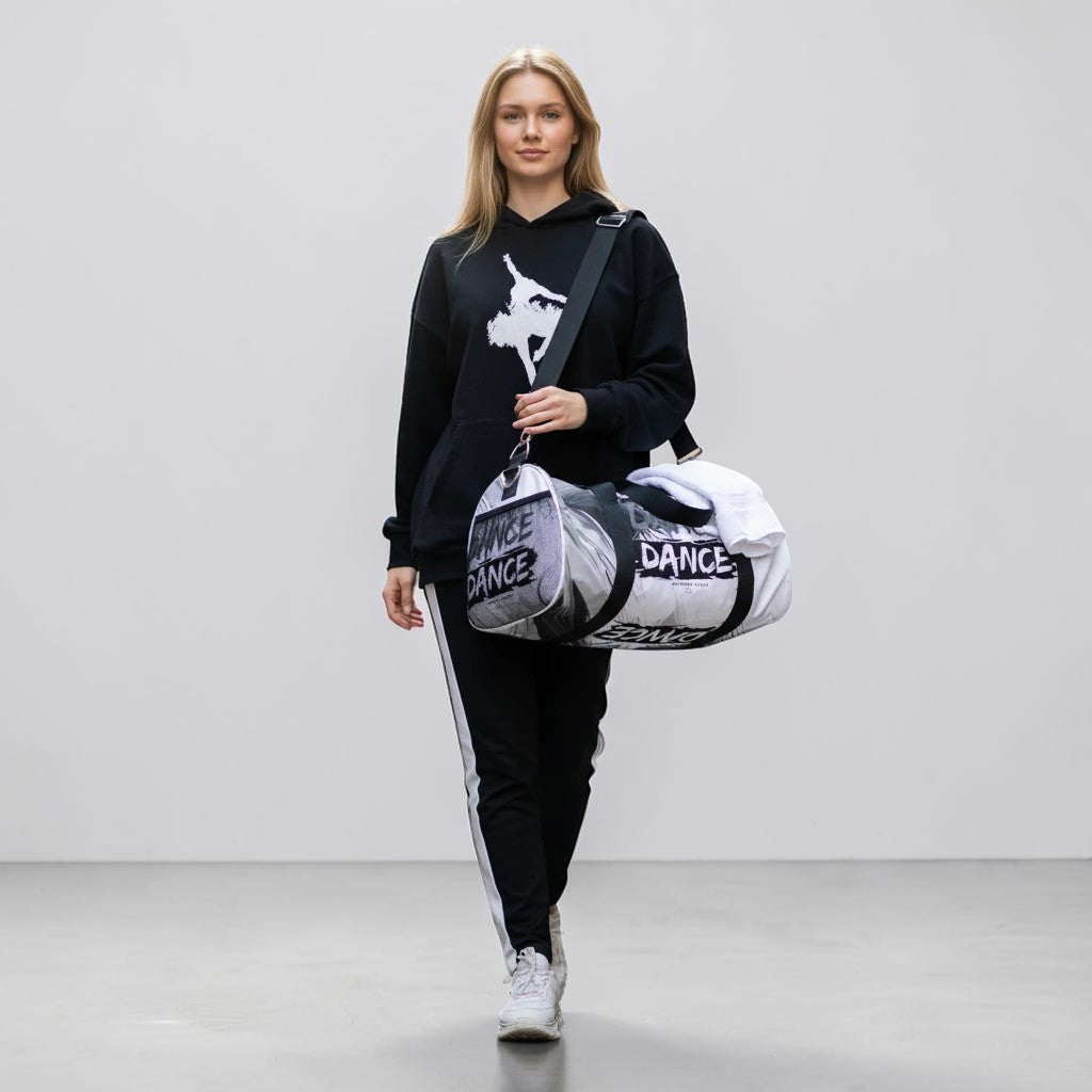 MONROE STORE bolsa de gimnasio negra y blanca con estampado "DANCE", cierre de cremallera doble y correa ajustable.