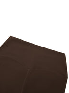 MONROE STORE dark brown high-waisted yoga leggings with a skinny fit and visible stitching details.