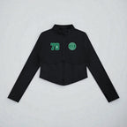 MONROE STORE chaqueta de yoga negra de manga larga con cremallera frontal, cuello alto y detalle de canalé en la cintura.
