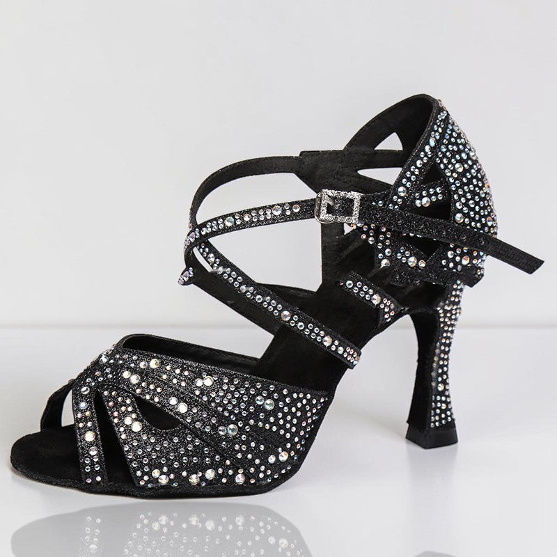 MONROE STORE black strappy ballroom dance heels featuring shimmering crystal embellishments and a secure ankle strap.