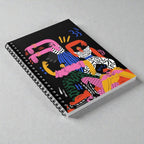 MONROE STORE Cuaderno de espiral con diseño abstracto de figuras en negro, rosa, amarillo, azul y verde.