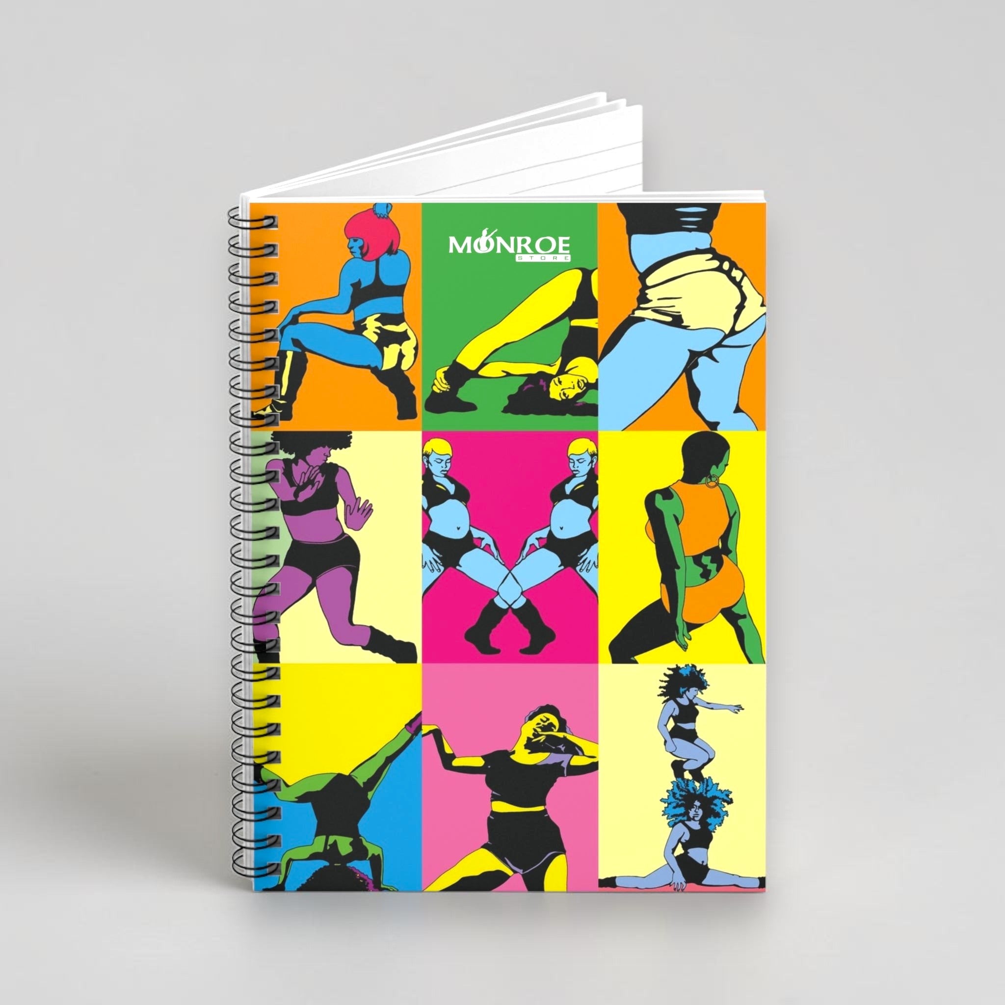 Cuaderno de espiral MONROE STORE con diseño pop art de bailarinas de dancehall en colores vibrantes y páginas rayadas.
