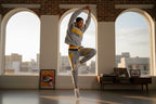 MONROE STORE grey and yellow athletic tracksuit with crewneck sweatshirt and joggers, woman dancing