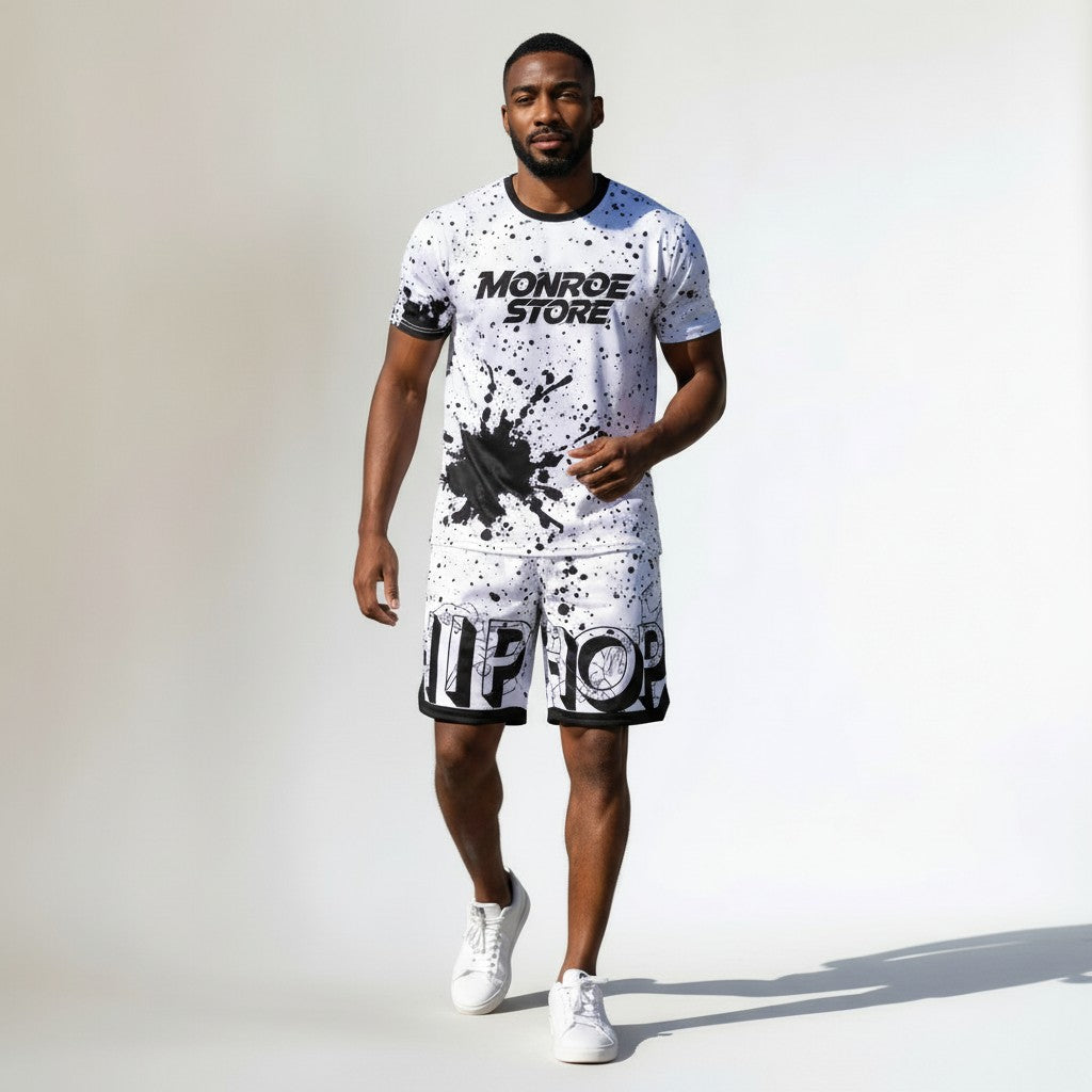 MONROE STORE men's white polyester shorts with black paint splatter print and "HIP HOP" text detail.
