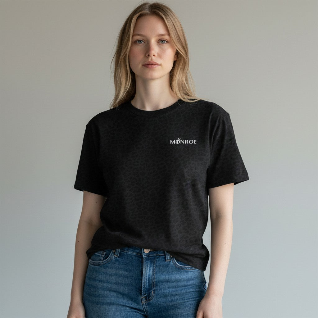 MONROE STORE men's dark grey graphic tee with all-over animal print and small white logo on chest. Made of cotton polyester blend.