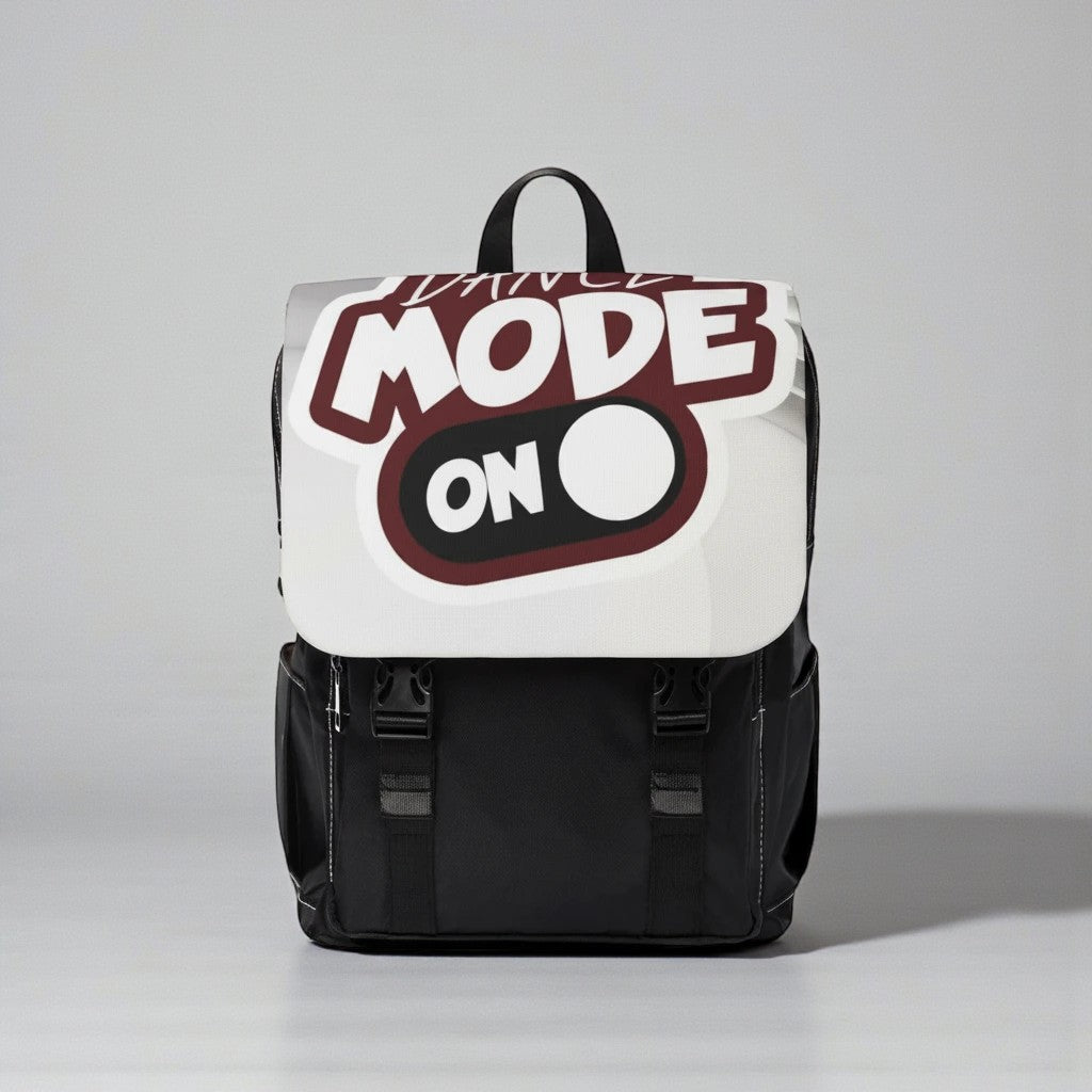 Mochila MONROE STORE negra de lona con diseño divertido 'Dance Mode On' y múltiples compartimentos.
