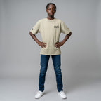 MONROE STORE oversized faded beige t-shirt, 100% cotton, with 'HIP HOP DANCER' text on the back and graphic details on sleeves.