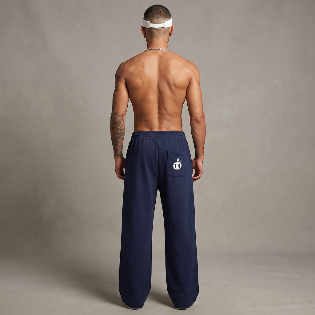 Pantalones de chándal azul marino de MONROE STORE con corte recto, cintura elástica y bolsillo trasero con logo.