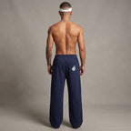 Pantalones de chándal azul marino de MONROE STORE con corte recto, cintura elástica y bolsillo trasero con logo.