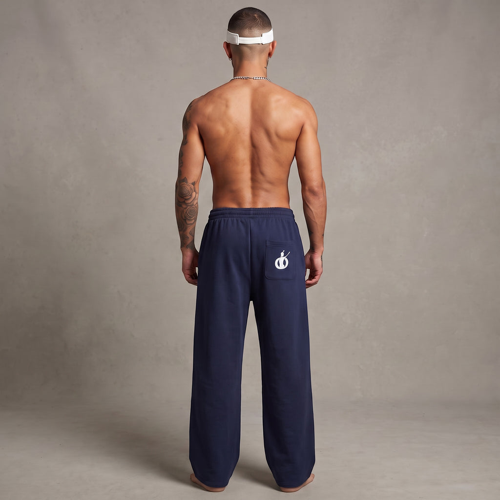 Pantalones de chándal azul marino de MONROE STORE con corte recto, cintura elástica y bolsillo trasero con logo.