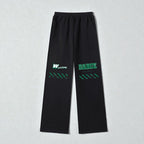 MONROE STORE pantalones de chándal negros de pierna ancha con estampado "WAAcking DANCE" en verde, cintura elástica y cordón.