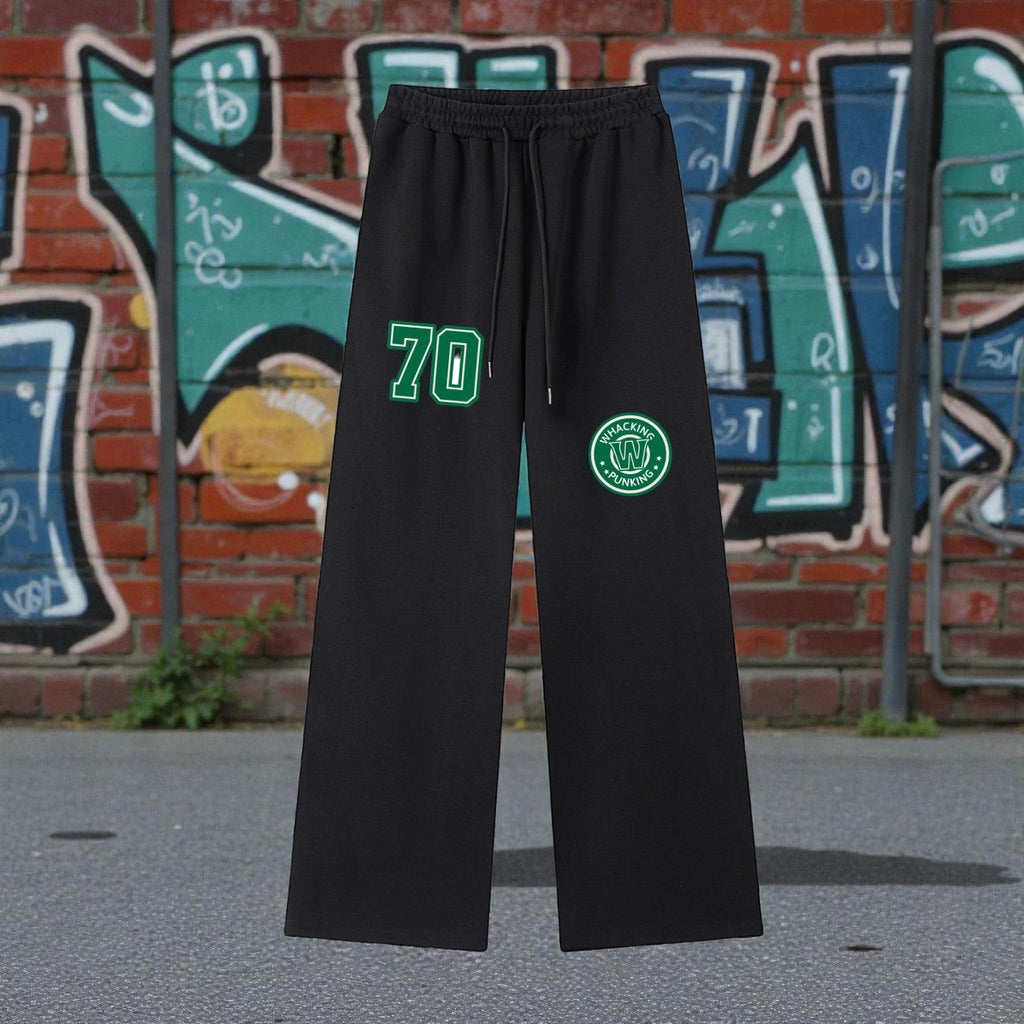 MONROE STORE pantalones de chándal negros de pierna ancha con cordón, cintura elástica y estampado "70" y logo circular.