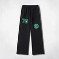 MONROE STORE pantalones de chándal negros de pierna ancha con cordón, cintura elástica y estampado "70" y logo circular.