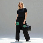 MONROE STORE pantalones de chándal negros de pierna ancha para mujer, 80% algodón, con cordón y estampado "70" verde.