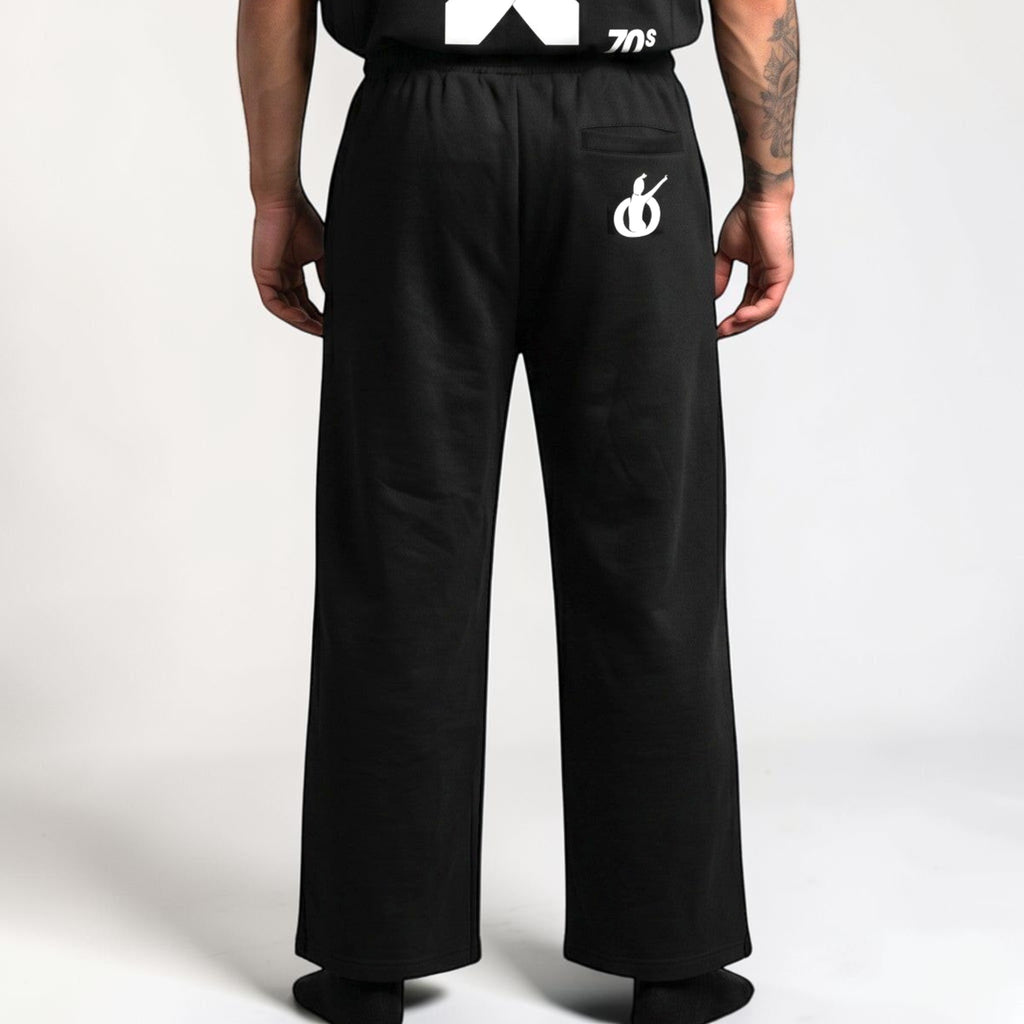 MONROE STORE pantalones de chándal negros de pierna ancha unisex, 80% algodón, 20% poliéster, cintura elástica con cordón.