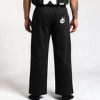 MONROE STORE pantalones de chándal negros de pierna ancha unisex, 80% algodón, 20% poliéster, cintura elástica con cordón.