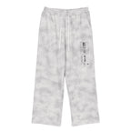 Pantalones deportivos MONROE STORE de corte holgado en gris con efecto lavado y estampado gráfico frontal