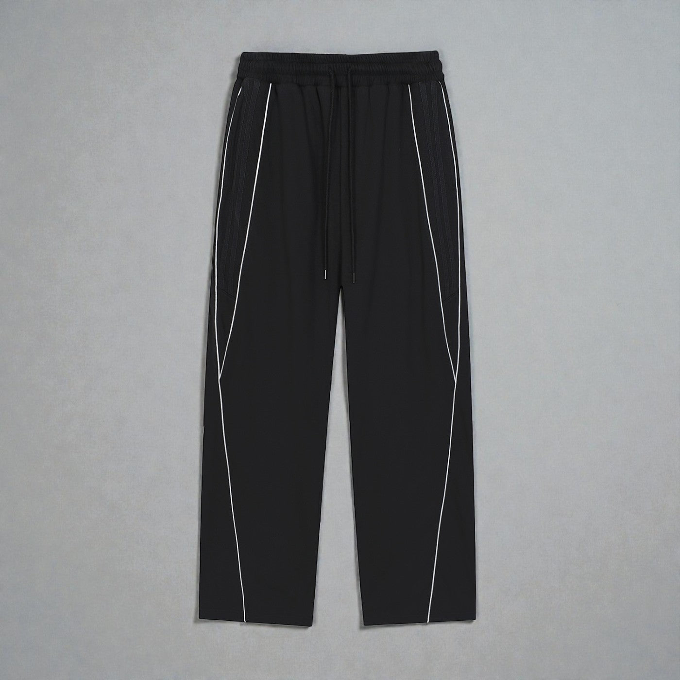 MONROE STORE Pantalones deportivos negros de pierna recta con cordón y detalles de rayas blancas reflectantes.
