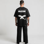 MONROE STORE Unisex Heavyweight Barrel Leg Sweatpants de algodón y poliéster en negro con cintura elástica y cordón.