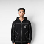 MONROE STORE sudadera con capucha negra de cremallera, de corte holgado, con costuras de contraste y logo bordado en el pecho.