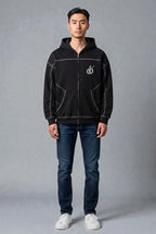 MONROE STORE Sudadera con cremallera negra de corte holgado con costuras de contraste y capucha, confeccionada en mezcla de poliéster y algodón.