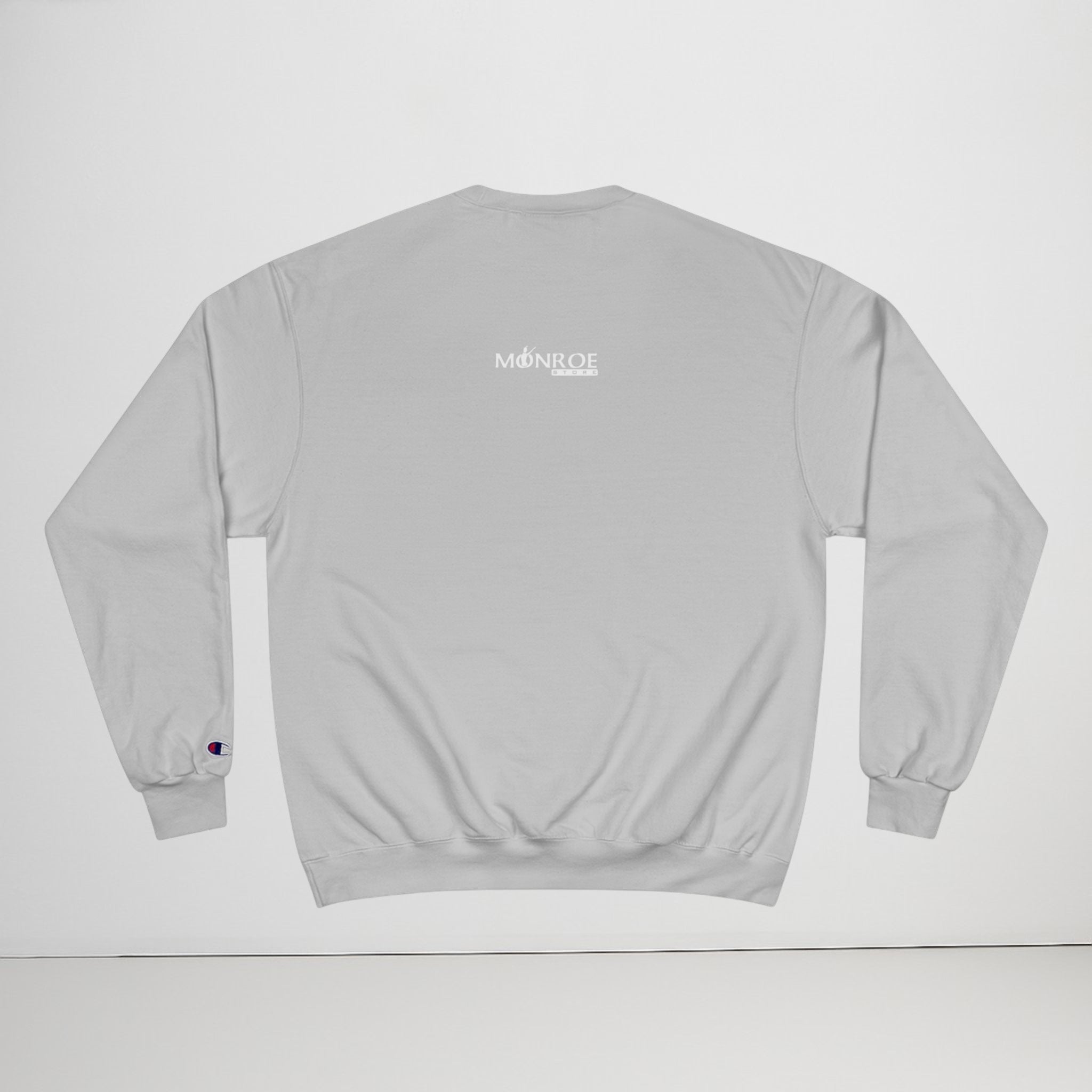 MONROE STORE sudadera gris de algodón y poliéster con cuello redondo y logo "C" en la manga.
