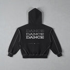 MONROE STORE sudadera negra con capucha y cremallera, con texto "DANCE" repetido y costuras de contraste.